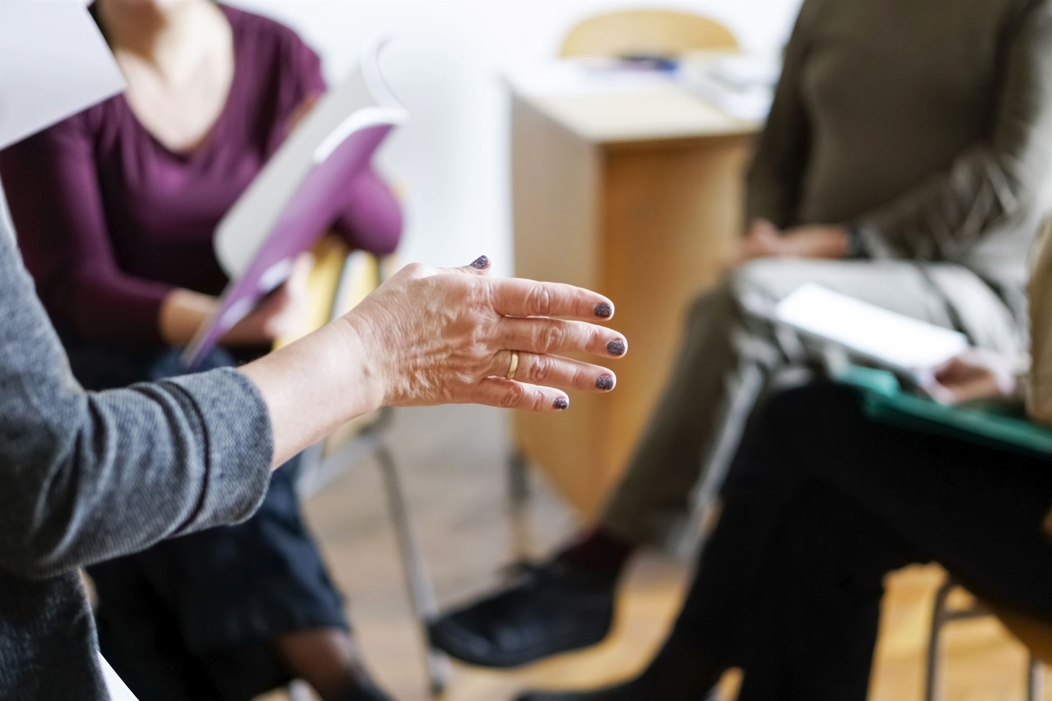 Group-of-adults-sitting-in-circle-2